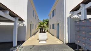 Appartements Vaux sur Mer - LES JARDINS D'AGATHE - VILLA MITOYENNE - marche a pied : photos des chambres