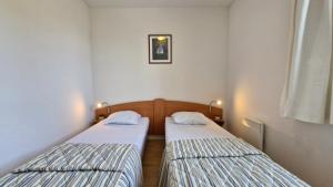 Appartements Vaux sur Mer - LES JARDINS D'AGATHE - VILLA MITOYENNE - marche a pied : photos des chambres