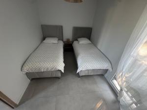 Appartements Appartement plage de debarquement-Asnelles : photos des chambres