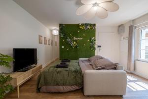 Appartements L-Escapade Vegetale - Centre Ville : photos des chambres