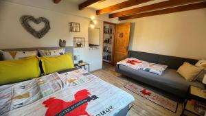 Maisons de vacances GITE LE COQ ROUGE : photos des chambres