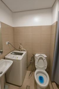 Cozy 1BR beside MOA with Wifi, Netflix, Pool & Washer