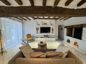 Maisons de vacances House in Mansigne with Fenced Garden : photos des chambres