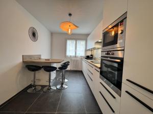 Appartements Apartment in Le Mans with Retro-Chic Style : photos des chambres