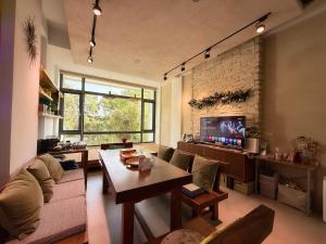 礁溪好好沐包棟溫泉Villa 龜山島景觀 客餐廳可開伙 KTV Netflix 禁菸 戶外平面停車 - 4hvězdičkové hotely ve městě Ťiao-si