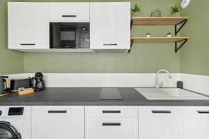 Appartements le SPARN - Votre cocon au coeur d-Epernay : photos des chambres