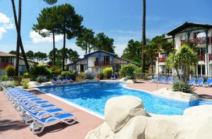 Villages vacances Residence Odalys Les Greens du Bassin : photos des chambres