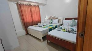 1148a 3br 1-king size 1queen size 2 double size 2-single size 1-extra matress Moa view