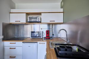Appartements Les Hirondelles - 800 m de la plage : photos des chambres