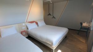 Hotels Ibis Budget La Rochelle Puilboreau : photos des chambres