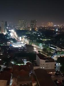 Alpine Room at TreePark City Apartement