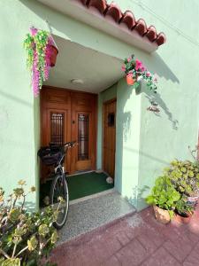 Town House in Old Village Ador, Ganda with big roof terrace with seaview