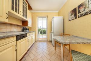 CBlue "Ferienhaus am Yachthafen - Strandläufer"