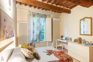 Le Mura, L Amphitheatrum e San Frediano