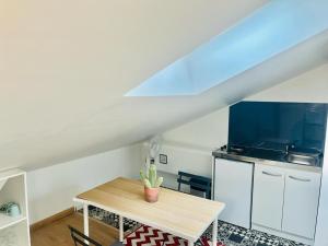 Appartements Chavalliaud 10 studio cosy a 2 pas du centre : photos des chambres