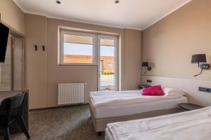 Twin Room with Shared Bathroom room in Hotel Center Novo Mesto