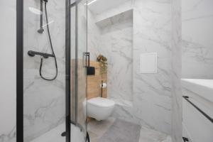 Salezego Apartment with Balcony near PGE Narodowy Warsaw by Noclegi Renters