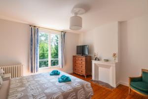 Maisons de vacances L'Ile des Iris - a 200 m de la plage : photos des chambres