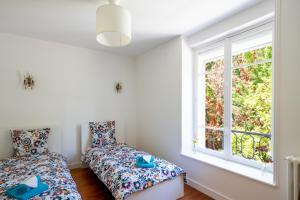 Maisons de vacances L'Ile des Iris - a 200 m de la plage : photos des chambres