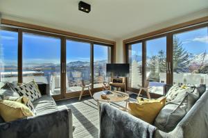 ARC 1600, LE RIDGE, Appartement 12 personnes Duplex Vue Montagne - Ski aux pieds - Sauna, Hammam, Piscine intérieure chauffée, Salle de sport & fitness