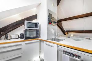 Appartements On the rooftops of Paris - Marais : photos des chambres