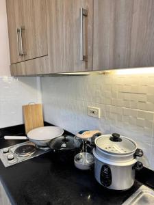 Relax in Pasay Citys Best Kept Secret - Spacious Condo with Garden View