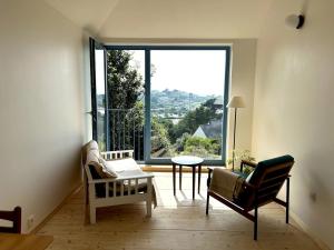 Maisons de vacances Small house with sea view : photos des chambres