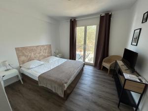 Hotels L'Aiglon Bylitis : photos des chambres