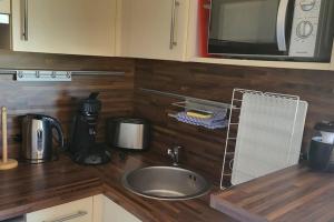 1 bedroom apartment with balcony near the beach