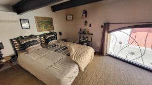 Maisons de vacances Maison au coeur d'un village, vue sur les montagnes : photos des chambres