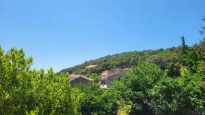 Maisons de vacances Maison au coeur d'un village, vue sur les montagnes : photos des chambres