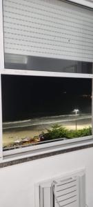 Apartamento de frente para o mar 3318