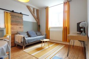 Appartements L-Echappee Boisee - close to train station and center : photos des chambres