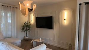 Maisons de vacances Maison elegante & jardin prive : photos des chambres