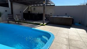 Jacuzzi e Piscina CASA Beto Carrero 4Q 3BWC a 300m do Parque Proximo a Praia churrasqueira e estacionamento privado