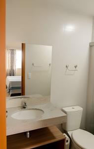 Apartamento Flat com vista das piscinas