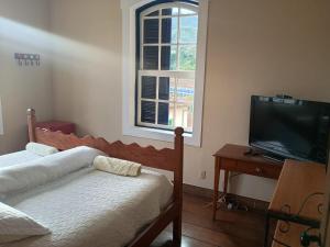 CASA RAIZ cama café e prosa