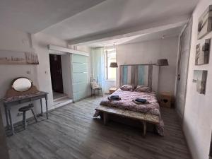 Appartement atypique, coeur de village