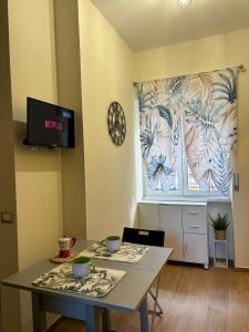 Casa Blaserna nel Cuore dello Shopping a Marconi e Trastevere