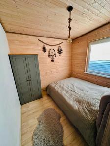 Žvejo Namelis prie Jūros