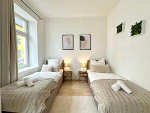 LIVA Stays Schwerin Zentrum - 4 Ferienwohnungen mit Küche und WLAN - Nähe Hauptbahnhof - Ideal für Familien & Monteure