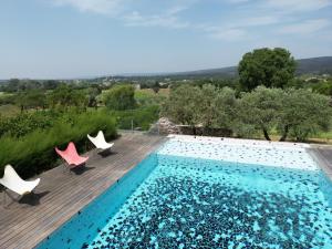 Maisons de vacances Le Poolhouse, Lodge avec piscine au coeur du Luberon : photos des chambres
