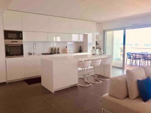 Appartements Haut standing- Face a la mer! 3 chambres-piscine semi olympique : photos des chambres