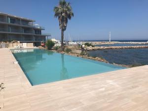 Appartements Haut standing- Face a la mer! 3 chambres-piscine semi olympique : photos des chambres