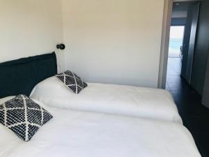 Appartements Haut standing- Face a la mer! 3 chambres-piscine semi olympique : photos des chambres