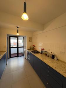 Apartment with art in Rosario river area