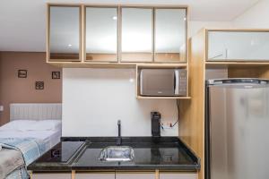 Estúdio AP no centro com piscina