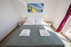 Apartments by the sea Banjol, Rab - 21635