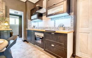 Maisons de vacances Cozy Home In Les Eyzies : photos des chambres