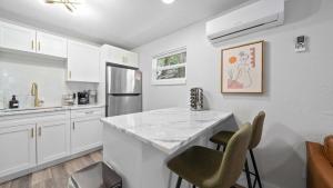 Modern-Retro Themed Home Close to Coffee + Food!